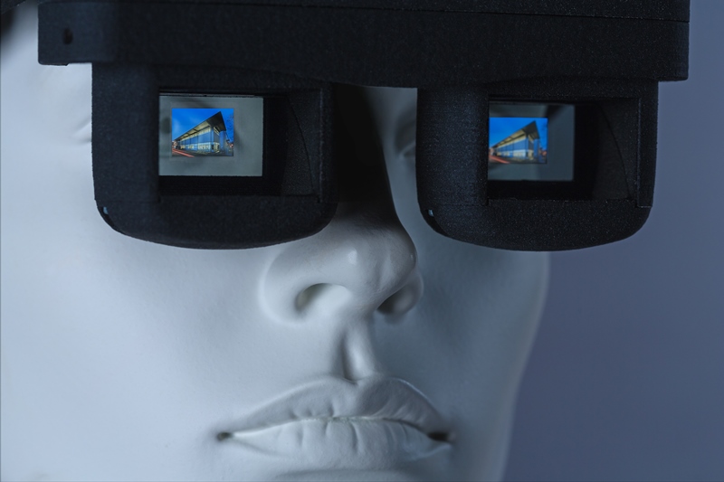 interactive, eye movement controlled data glasses with full color OLED microdisplays with integrated camera
